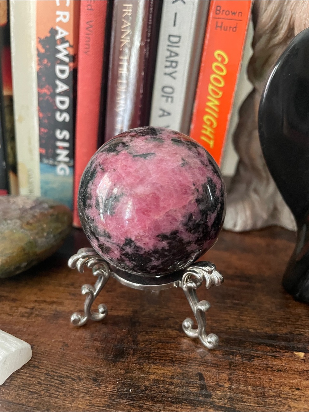 Pink and Black Natural Rhodonite Crystal Sphere ( Silver Stand Not included)